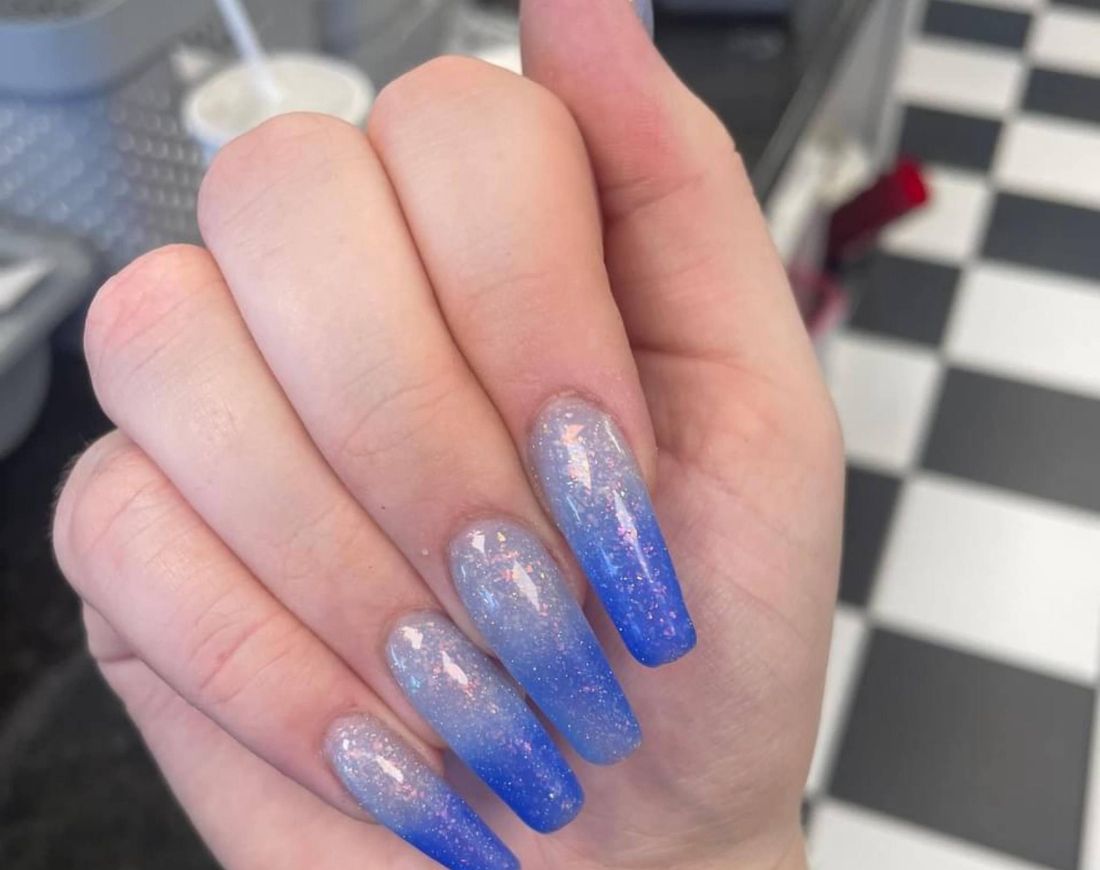 Long blue ombre nails with sparkle